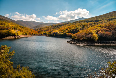 Scenic view of lake against sky during autumn