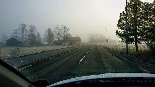 Road passing through country field