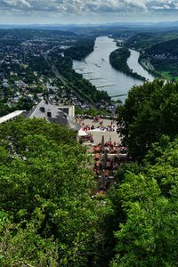 High angle view of buildings and trees in city