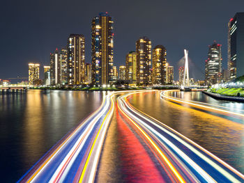 Light trail of a houseboat on the sumida river