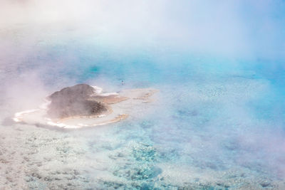 Landscape of colorful shapes at the edge of the excelsior geyser crater pool in yellowstone np