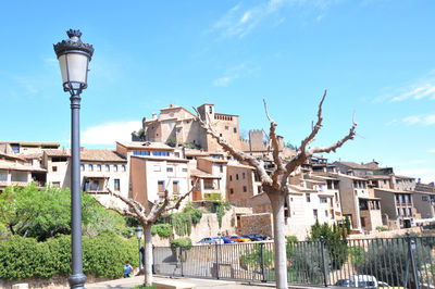 View of buildings against blue sky