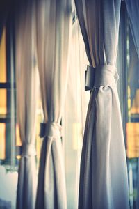 Close-up of curtains hanging at home