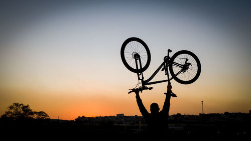 Silhouette of bicycle during sunset