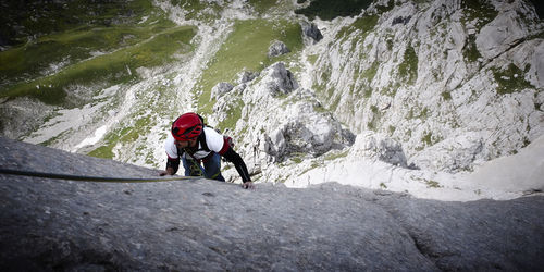 High angle view of man climbing mountain