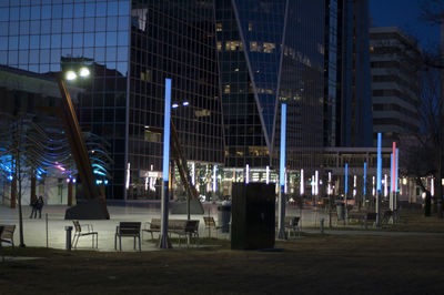 Modern buildings in city at night