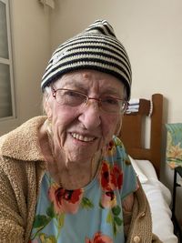 Portrait of senior woman sitting at home