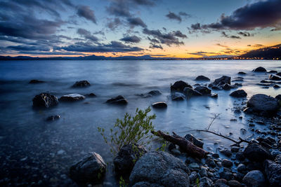 Scenic view of sea against sky during sunset