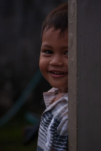 Close-up of boy looking away