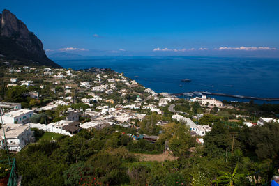 View of cityscape against blue sky