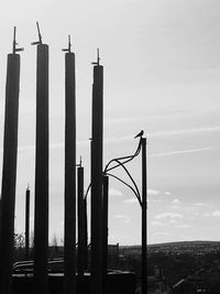 Low angle view of factory against sky
