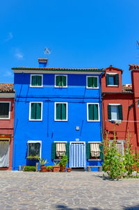 Residential building against blue sky