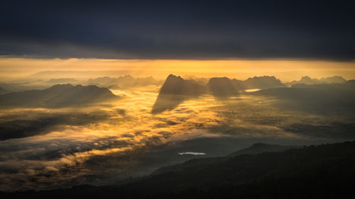 Scenic view of mountains against sky during sunset