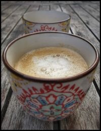 Close-up of coffee cup on table