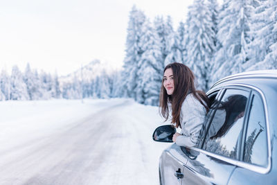 Portrait of woman in car