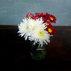 Close-up of flower vase on table