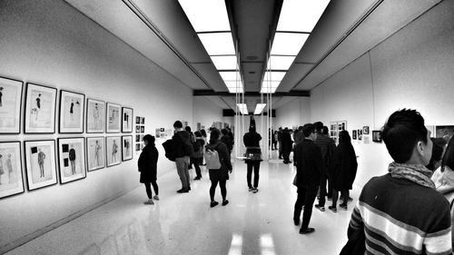 People standing in corridor