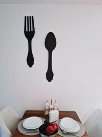 High angle view of wine and glasses on table