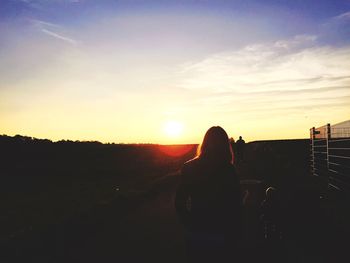 Scenic view of landscape at sunset