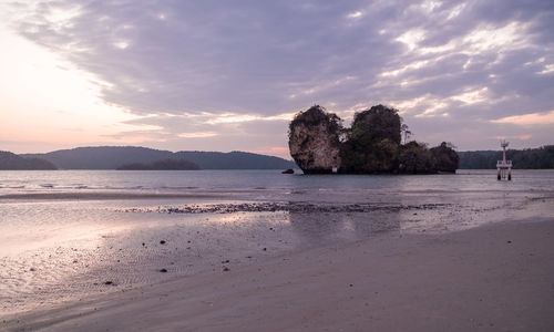 Scenic view of sea against sky at sunset