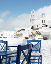 View of white building against blue sky