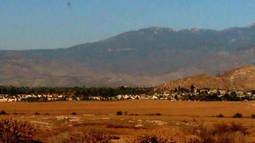 Scenic view of mountains against clear sky