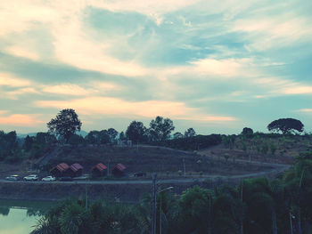 Scenic view of field against sky during sunset