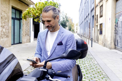 Young man using mobile phone