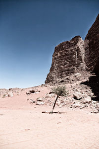 Rock formation on land against sky