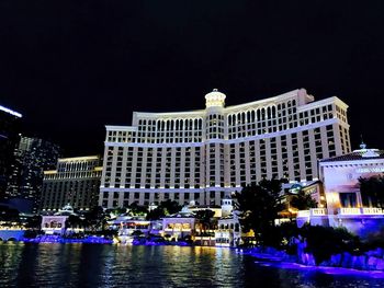 Buildings in city at night