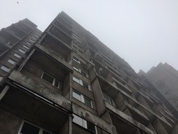 Low angle view of buildings against clear sky