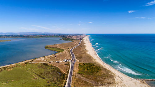 High angle view of sea against blue sky