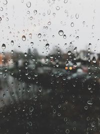 Full frame shot of raindrops on window