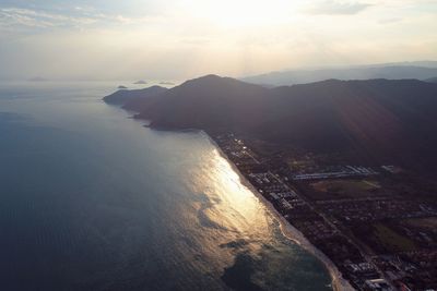 High angle view of sea against sky during sunset