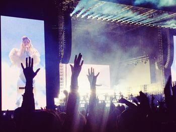 Panoramic view of crowd at music concert