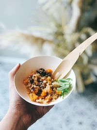 Close-up of hand holding food