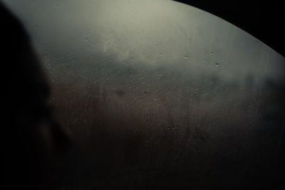 Close-up of wet window in rainy season