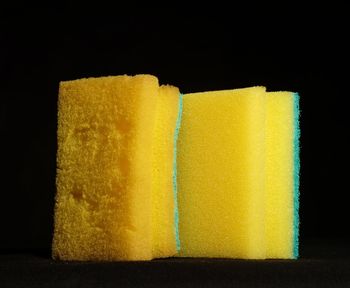 Close-up of yellow against black background