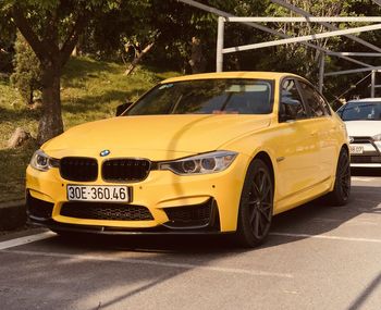 Yellow car on road