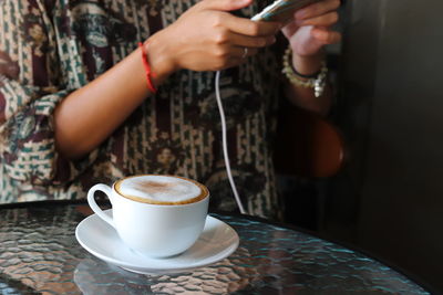 Coffee cup on table