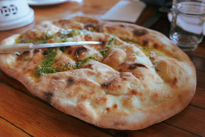 High angle view of pizza on table