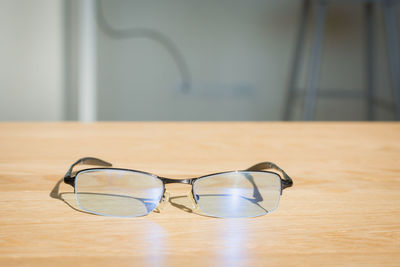 Close-up of eyeglasses on table