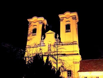 Low angle view of bell tower at night