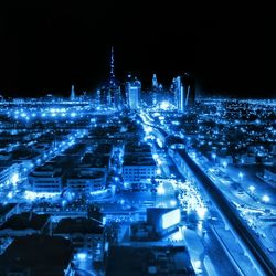 Illuminated cityscape at night