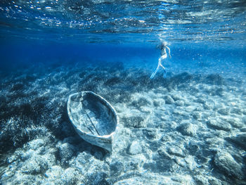 Full length of woman swimming in sea