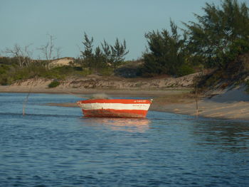 Boats in calm lake