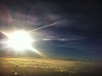 Sun shining through clouds