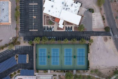 Aerial view of tennis courts straight down drone shot.