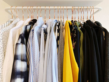 Panoramic view of clothes hanging in rack