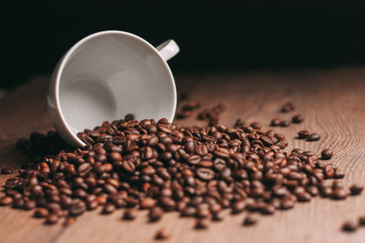 Close-up of coffee beans on table